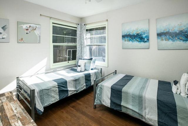 bedroom featuring dark hardwood / wood-style floors