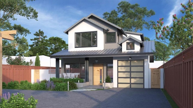 view of front of house featuring a porch and a garage