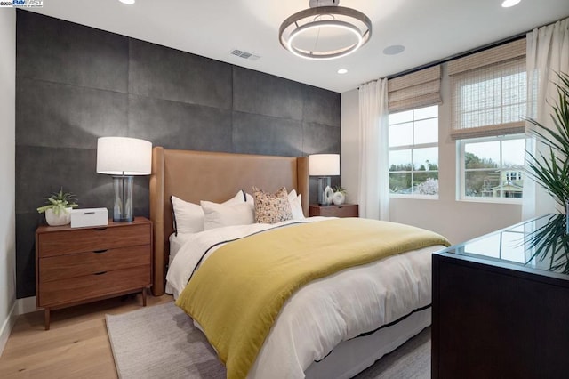 bedroom featuring light hardwood / wood-style floors