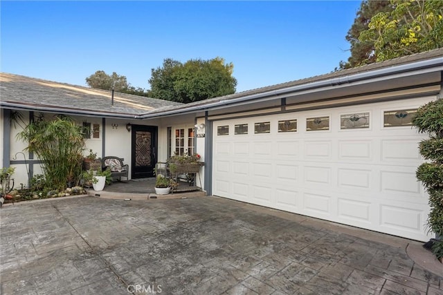 ranch-style house with a garage