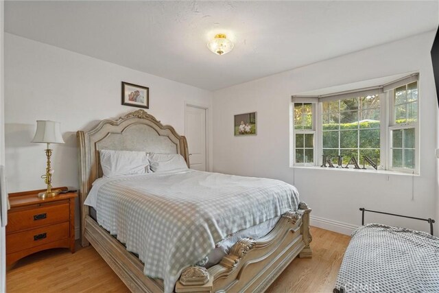 bedroom featuring light wood-type flooring