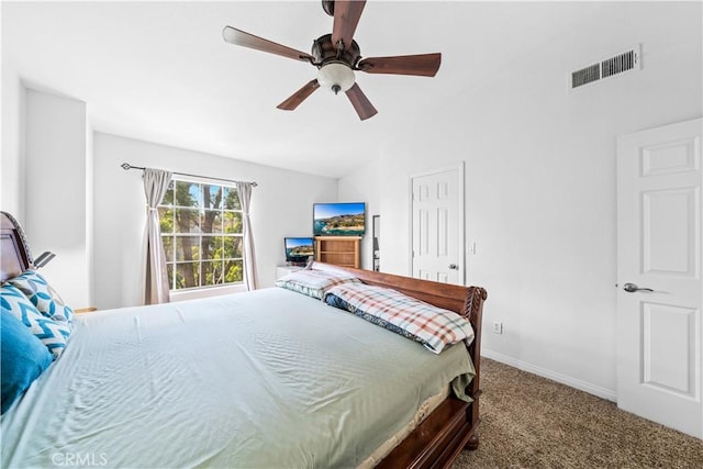 carpeted bedroom with lofted ceiling and ceiling fan