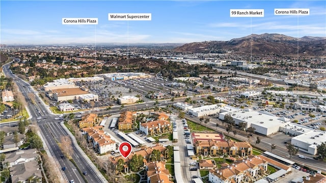 drone / aerial view featuring a mountain view