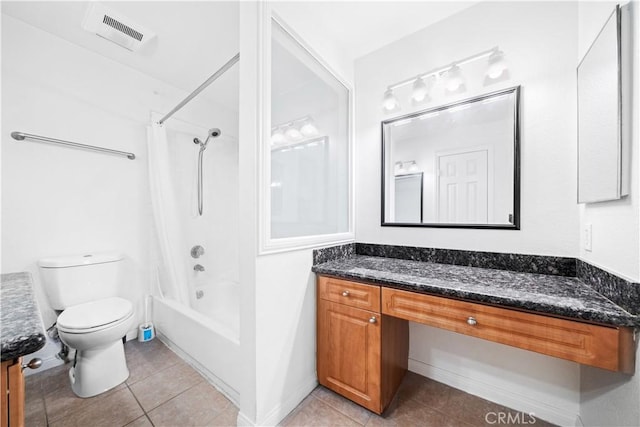 full bathroom featuring tile patterned flooring, vanity, shower / tub combo with curtain, and toilet