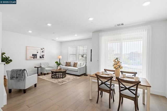 dining room featuring light hardwood / wood-style floors