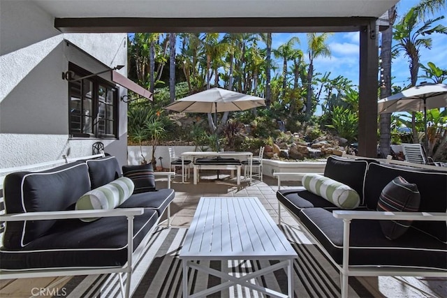 wooden deck featuring outdoor lounge area