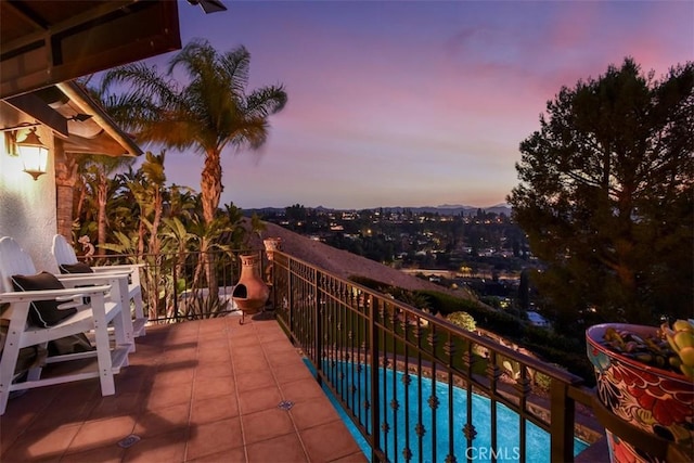 balcony at dusk with a patio area