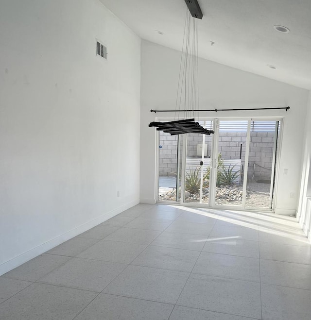 unfurnished living room featuring high vaulted ceiling