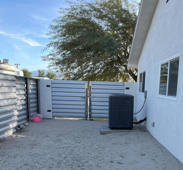 exterior space featuring central AC unit