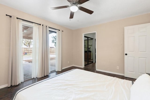 bedroom with connected bathroom, access to exterior, dark hardwood / wood-style floors, and ceiling fan