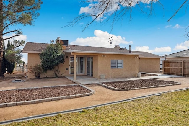 rear view of house with a patio area