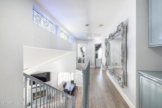 hall with dark wood-type flooring