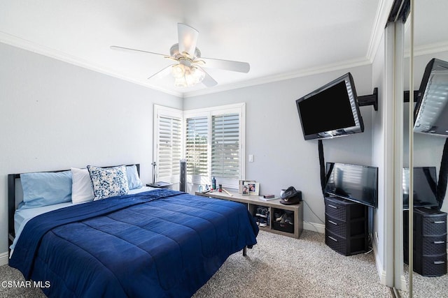 bedroom featuring ceiling fan, ornamental molding, and light colored carpet