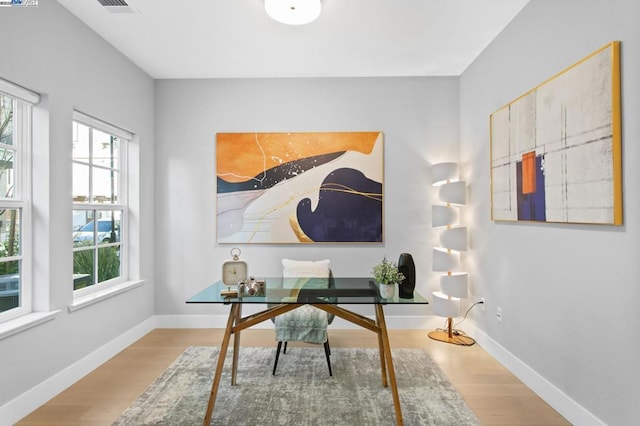 office space featuring light wood-type flooring