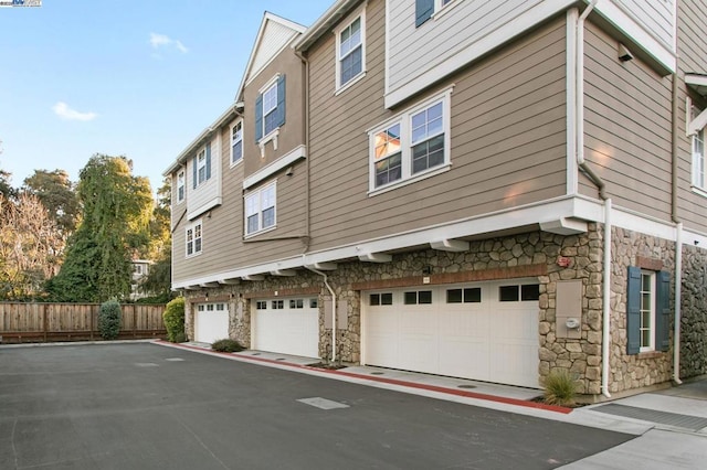 view of side of property featuring a garage