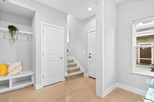 entryway with light hardwood / wood-style flooring