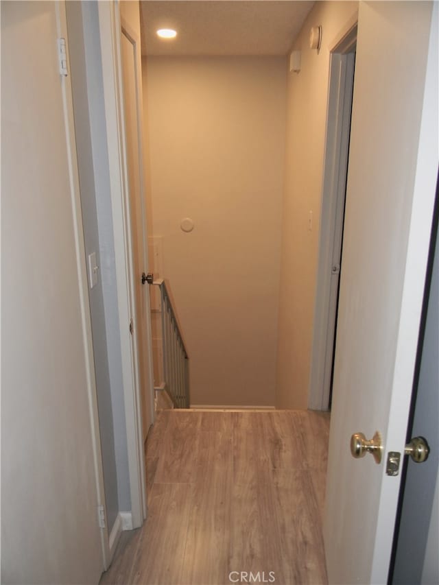 corridor featuring light hardwood / wood-style flooring