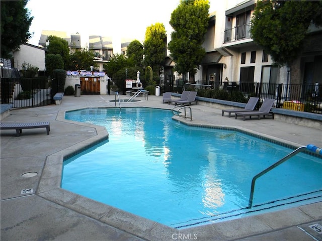 view of pool featuring a patio area