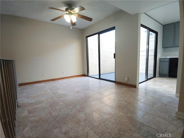 spare room featuring ceiling fan