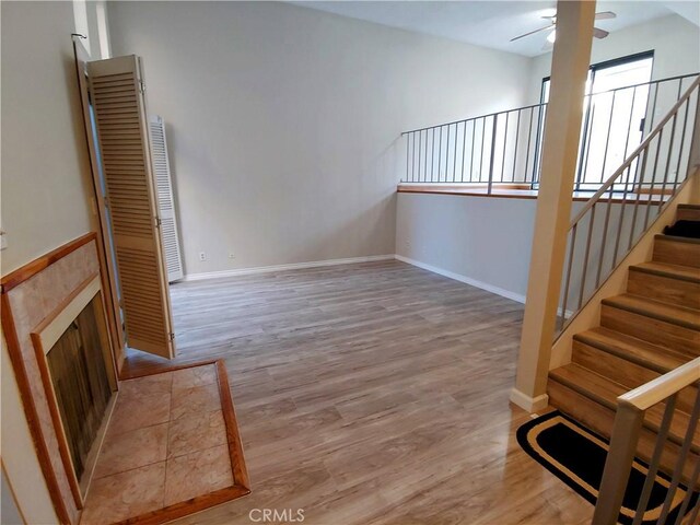 interior space featuring ceiling fan and light hardwood / wood-style floors