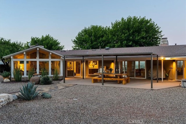 rear view of property with a patio