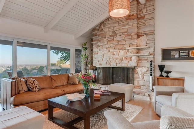 living room featuring a stone fireplace, high vaulted ceiling, and beam ceiling