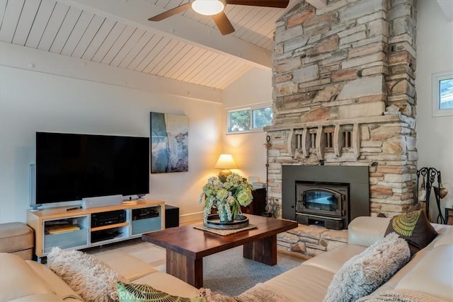 living room with vaulted ceiling with beams, wood ceiling, and ceiling fan