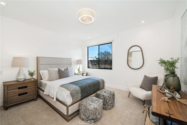 bedroom with carpet flooring and baseboards