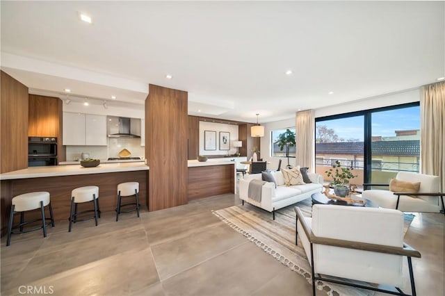 living room with recessed lighting