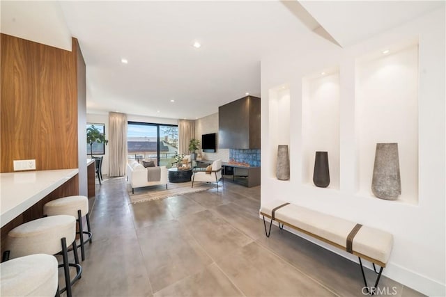 1223 Roxbury Dr Unit 202, Los Angeles, CA 90035 - hallway with recessed lighting and concrete floors