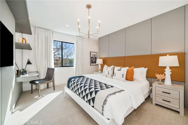 carpeted bedroom featuring a chandelier