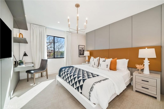 bedroom with a notable chandelier and light colored carpet