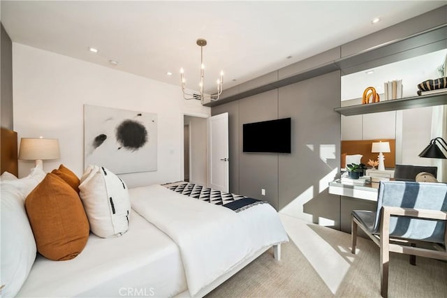 bedroom featuring a chandelier, light carpet, and recessed lighting