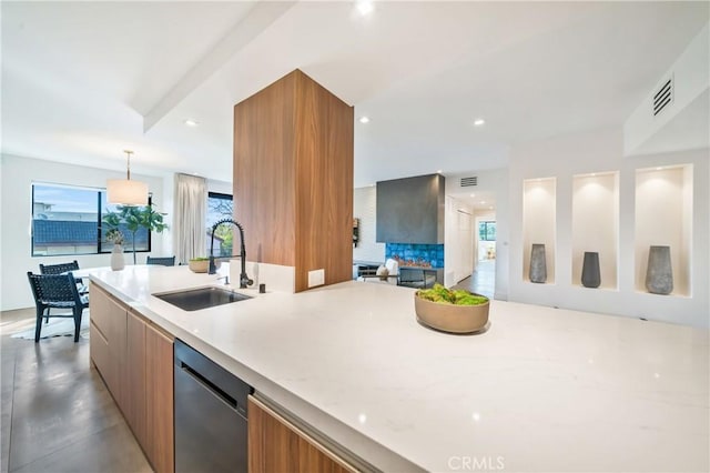 1223 Roxbury Dr Unit 202, Los Angeles, CA 90035 - kitchen with modern cabinets, stainless steel dishwasher, brown cabinets, open floor plan, and recessed lighting
