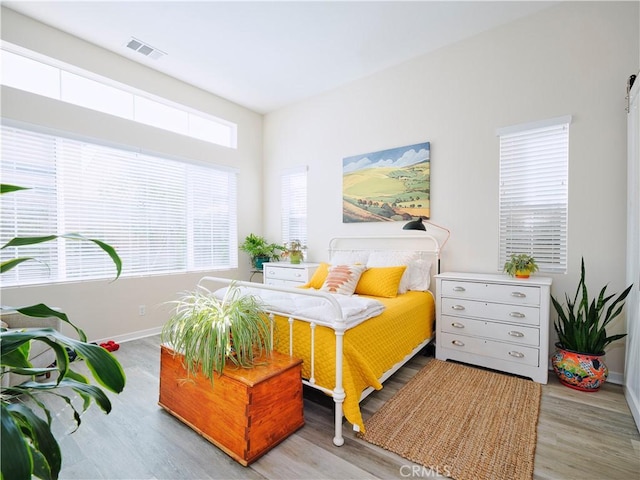 bedroom featuring light hardwood / wood-style flooring