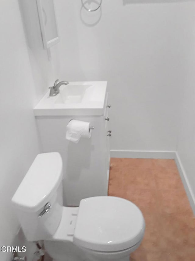 bathroom with sink and toilet