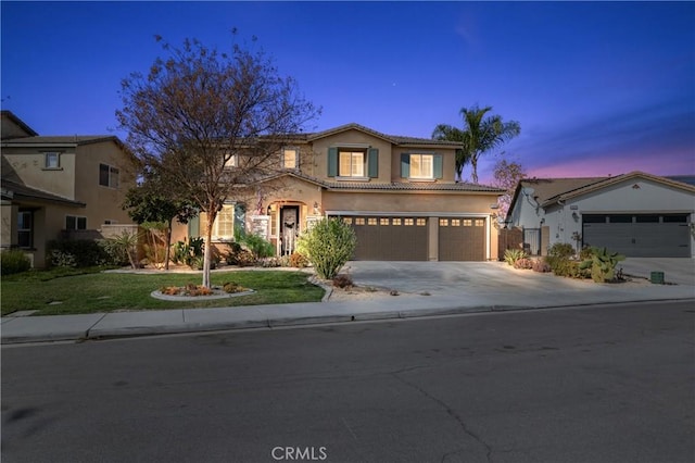 mediterranean / spanish-style home featuring a yard