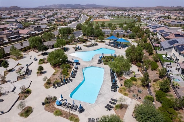 birds eye view of property featuring a mountain view