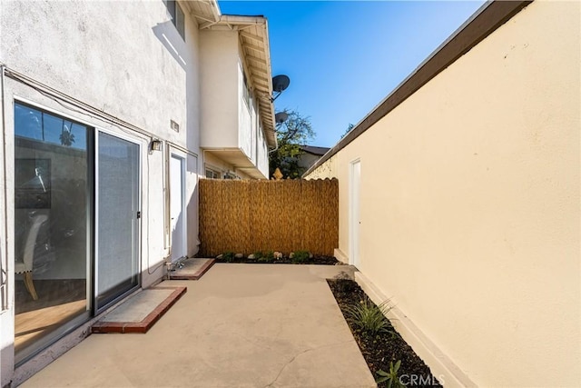 view of patio / terrace with fence