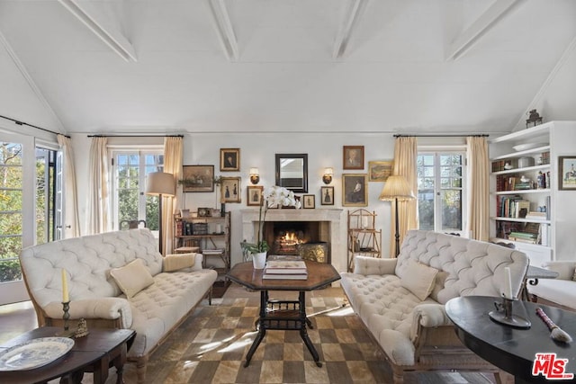 living room with lofted ceiling