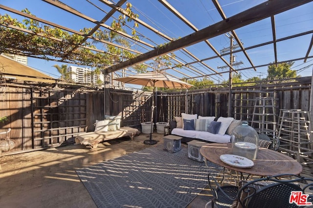 view of patio / terrace with outdoor lounge area and a pergola