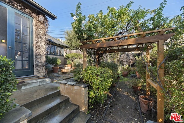 view of yard with a pergola