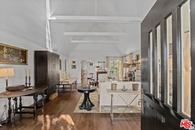 foyer entrance featuring beam ceiling, dark wood-type flooring, and high vaulted ceiling