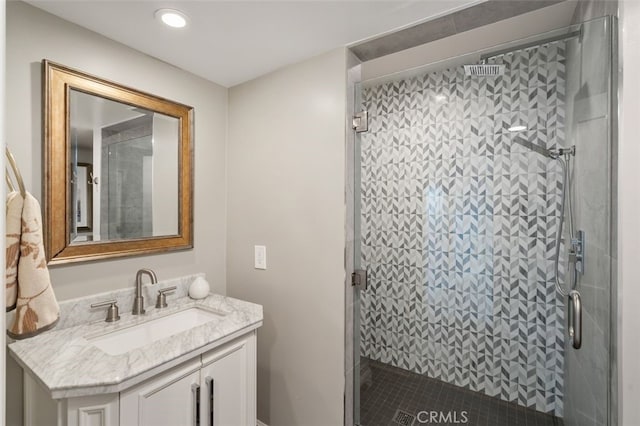 bathroom with vanity and an enclosed shower