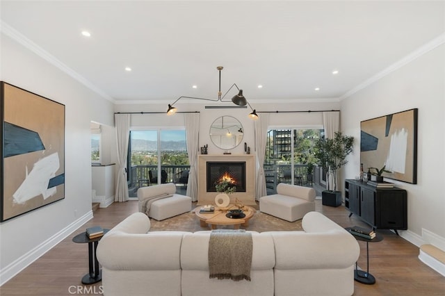 living room featuring crown molding and wood-type flooring