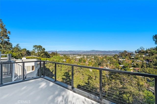 balcony featuring a mountain view