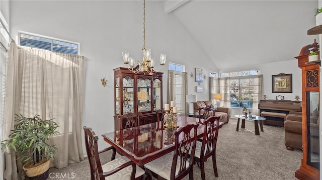 dining space featuring beam ceiling, carpet floors, an inviting chandelier, and high vaulted ceiling