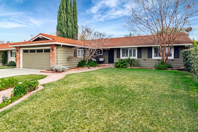 single story home with a garage and a front lawn