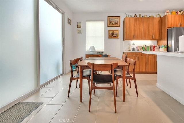 dining room with light tile patterned floors