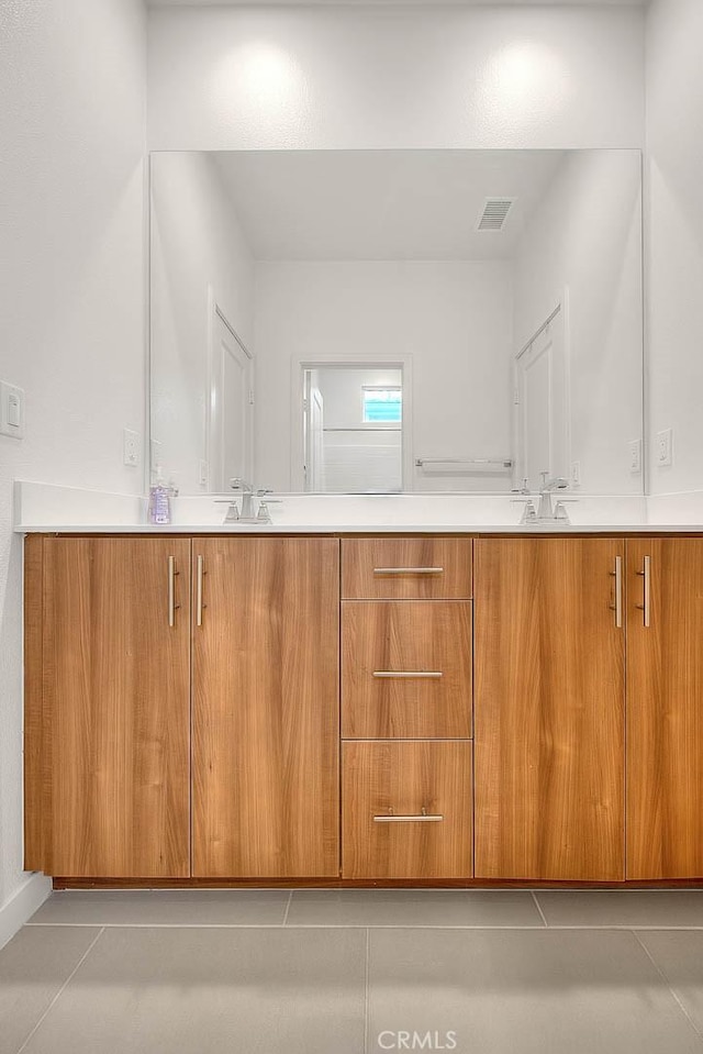 bathroom featuring vanity and tile patterned floors